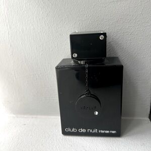 Sleek Black Perfume Bottle with Modern Design ONLY DROP OFFS. Text for meet up.